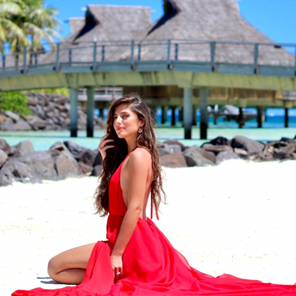 All eyes on you in this backless red maxi